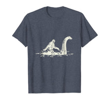 Load image into Gallery viewer, Bigfoot Sasquatch Riding The Loch Ness Monster Funny T-Shirt
